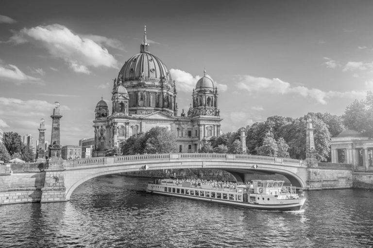 Berlin Cathedral with ship on Spree river at sunset, Berlin, Germany